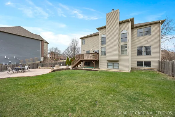 a aerial view of a house with a swimming pool