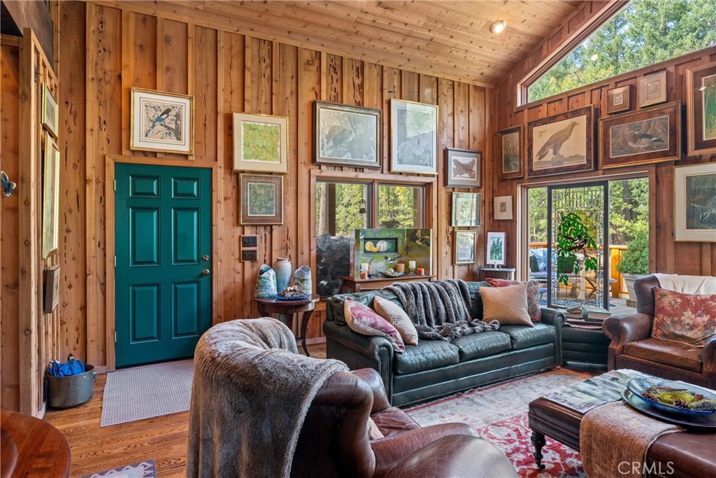 7501 Maddrill Lane Butte Meadows, CA 95942 - Photo 12 of 70 a living room with furniture large windows and wooden floor