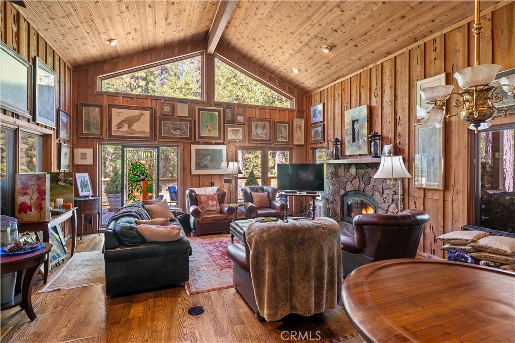 7501 Maddrill Lane Butte Meadows, CA 95942 - Photo 19 of 70 a living room with fireplace furniture and a large window