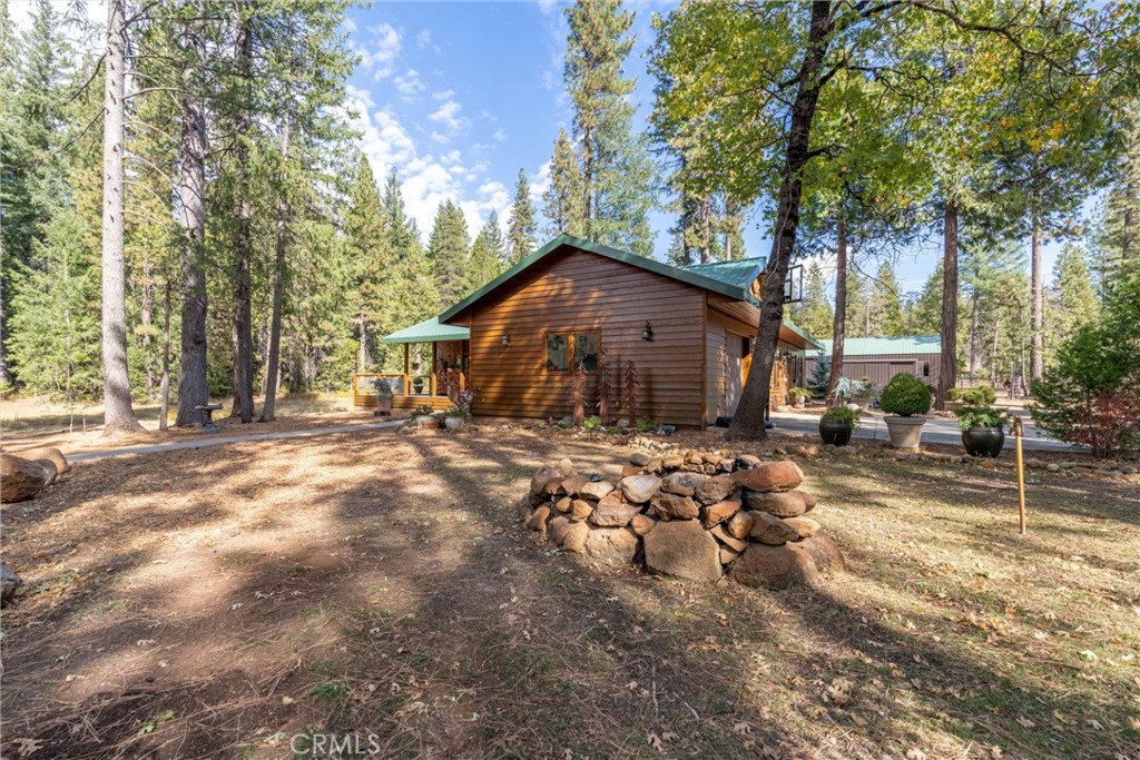 7501 Maddrill Lane Butte Meadows, CA 95942 - Photo 36 of 70 a view of a house with a yard