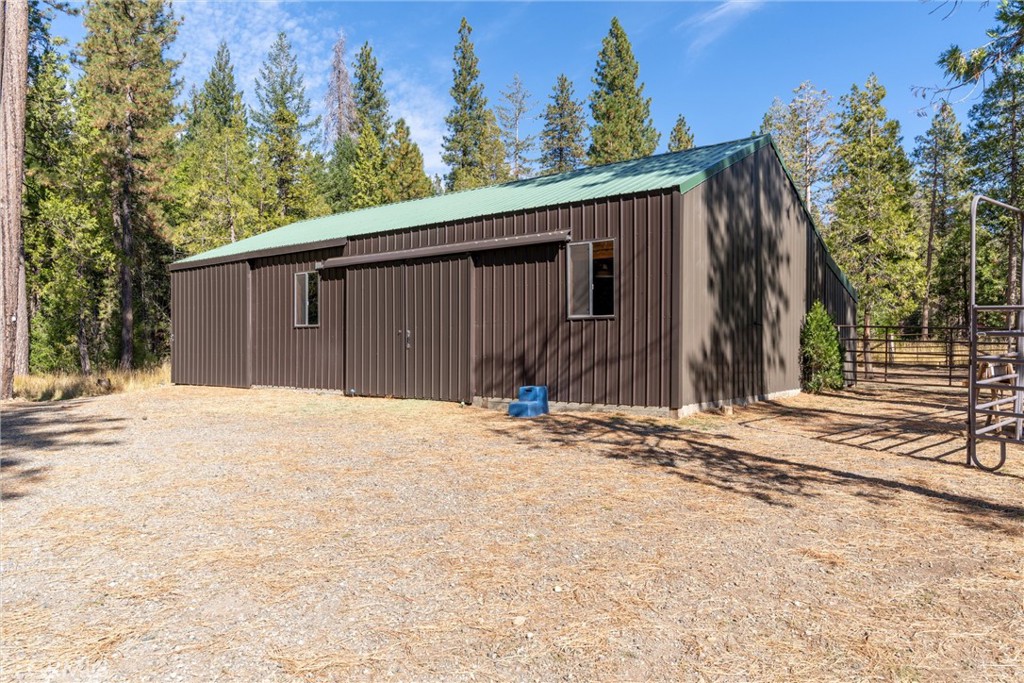 7501 Maddrill Lane Butte Meadows, CA 95942 - Photo 50 of 70 a house with trees in the background
