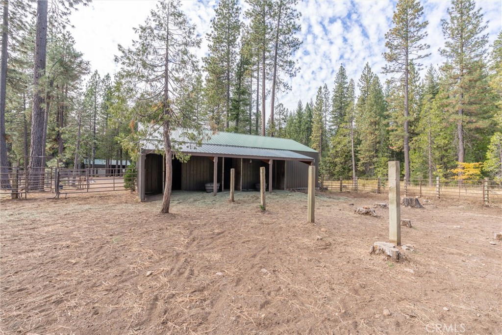 7501 Maddrill Lane Butte Meadows, CA 95942 - Photo 53 of 70 a front view of a house with a yard