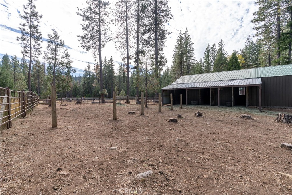 7501 Maddrill Lane Butte Meadows, CA 95942 - Photo 55 of 70 a front view of a house with a yard