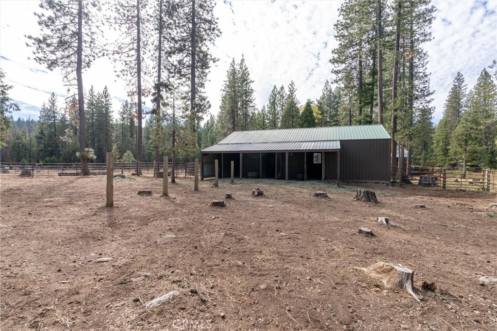 7501 Maddrill Lane Butte Meadows, CA 95942 - Photo 56 of 70 a front view of a house with a yard