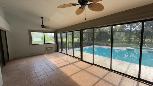 a view of an empty room and window