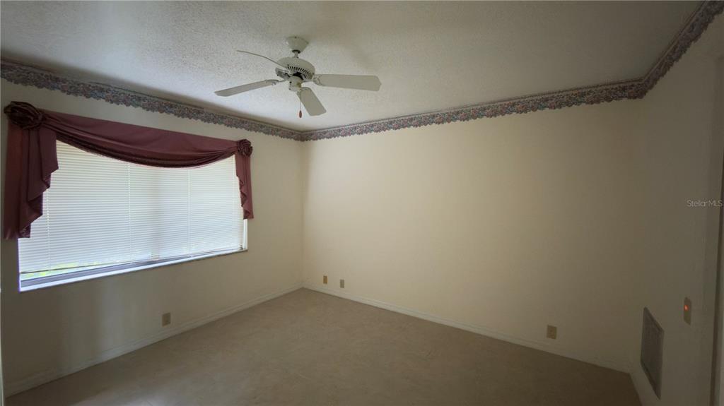 5040 Pinelake Road Wesley Chapel, FL 33543 - Photo 21 of 38 a view of an empty room