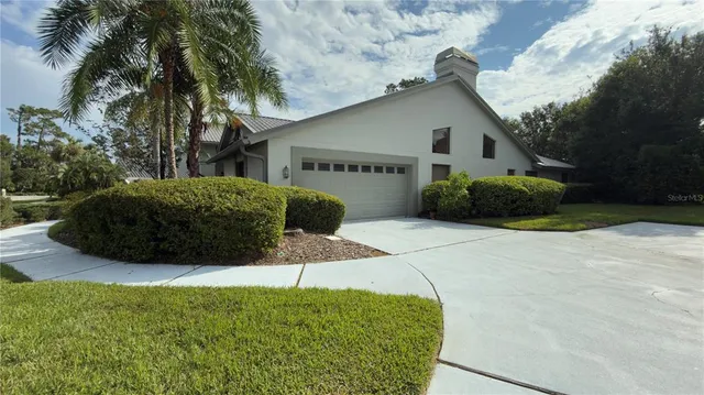 a house view with a outdoor space