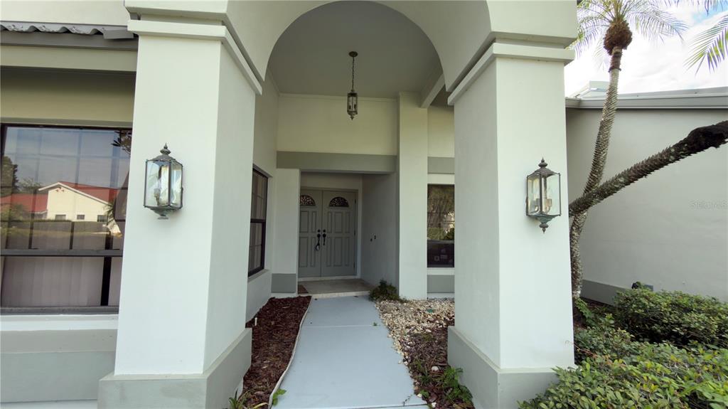 5040 Pinelake Road Wesley Chapel, FL 33543 - Photo 6 of 38 a view of balcony and furniture