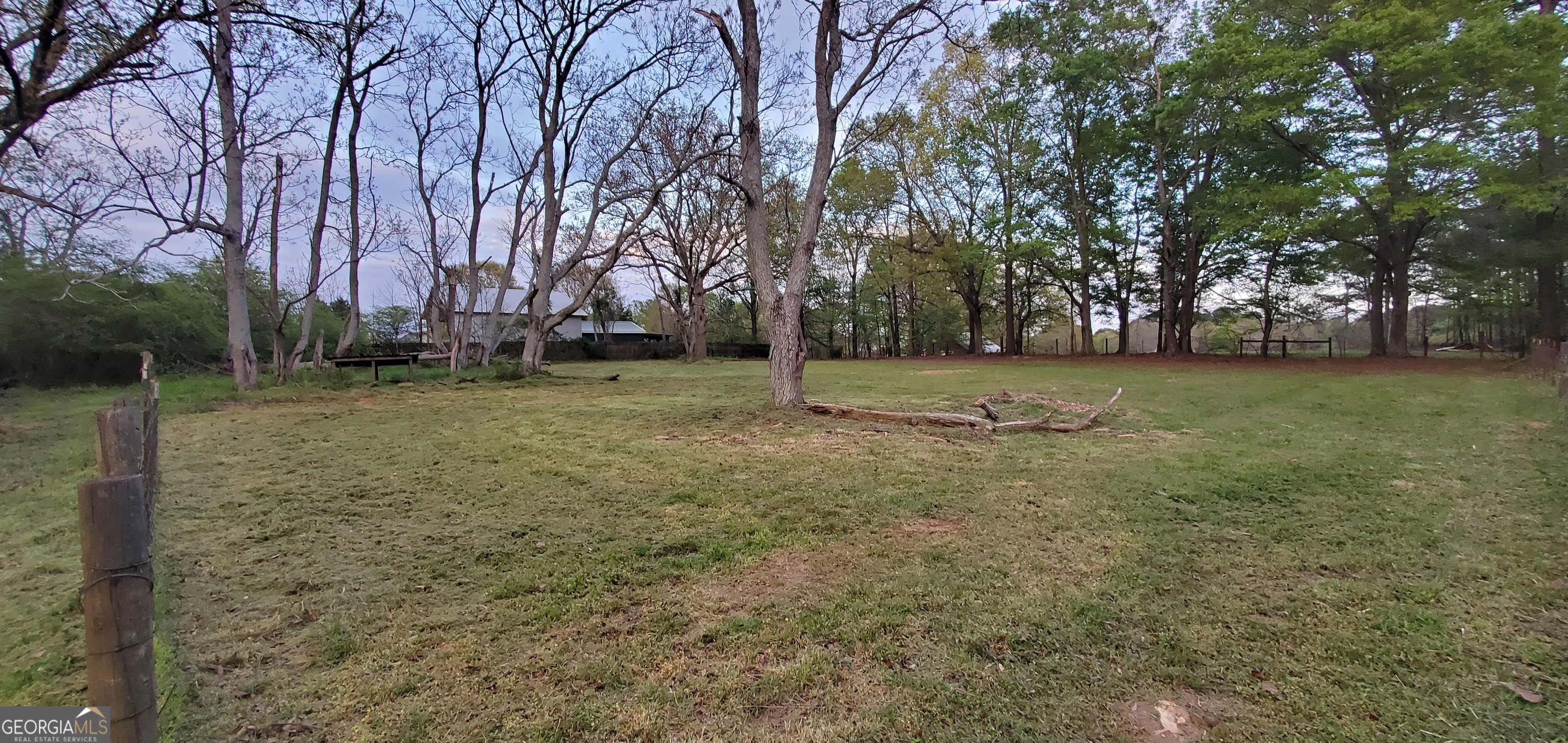 1061 Burger Road Watkinsville, GA 30677 - Photo 28 of 43 a view of a field with trees in the background