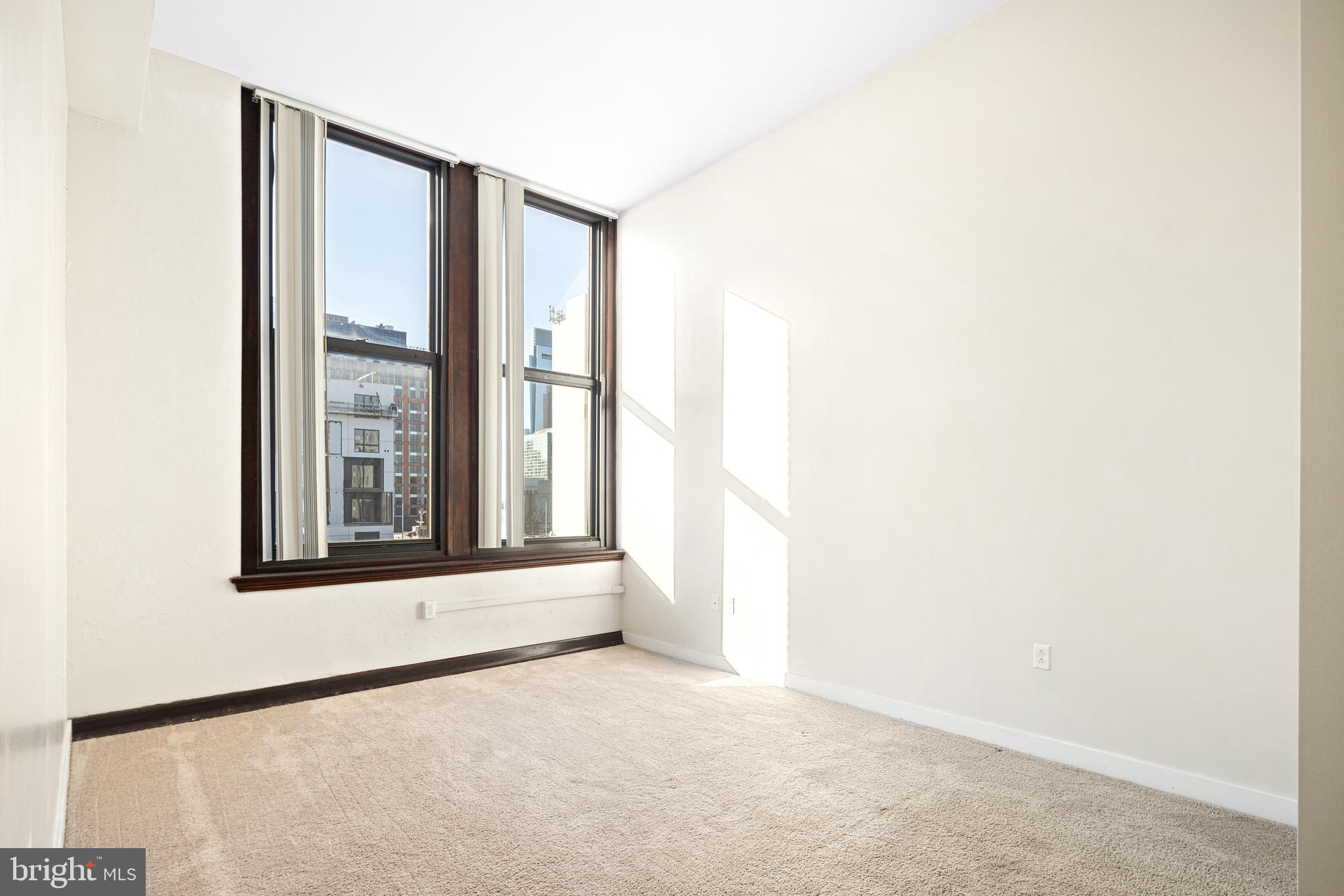 523 North Broad Street, Unit P1 Philadelphia, PA 19123 - Photo 22 of 37 a view of an empty room with a window