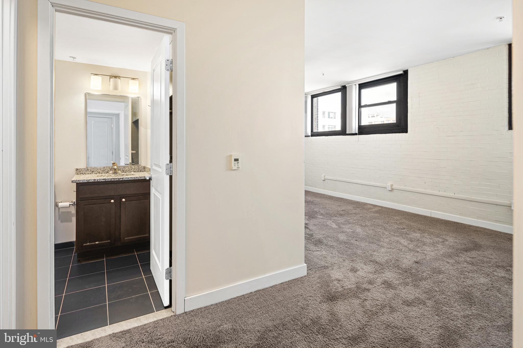 523 North Broad Street, Unit P1 Philadelphia, PA 19123 - Photo 30 of 37 wooden floor and windows in a room