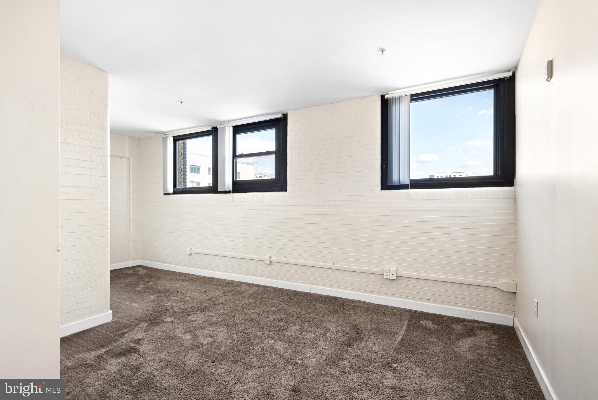 523 North Broad Street, Unit P1 Philadelphia, PA 19123 - Photo 33 of 37 an empty room with windows