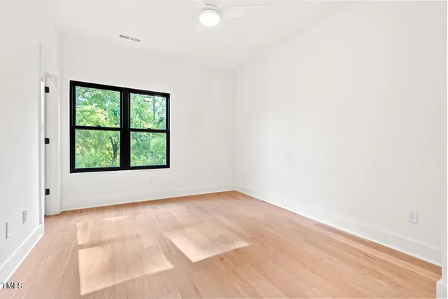 an empty room with windows