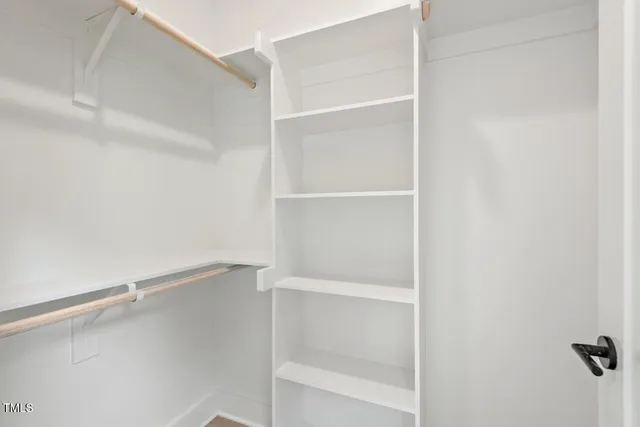 a bathroom with a sink and a window