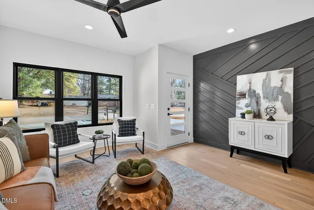 a living room with furniture and a window