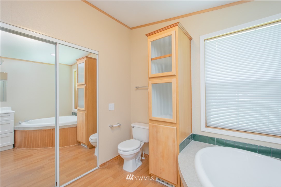 9134 176th Avenue Southwest Rochester, WA 98579 - Photo 17 of 24 a bathroom with a toilet and a shower