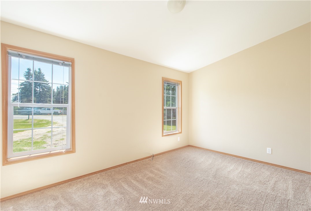 9134 176th Avenue Southwest Rochester, WA 98579 - Photo 20 of 24 an empty room with windows