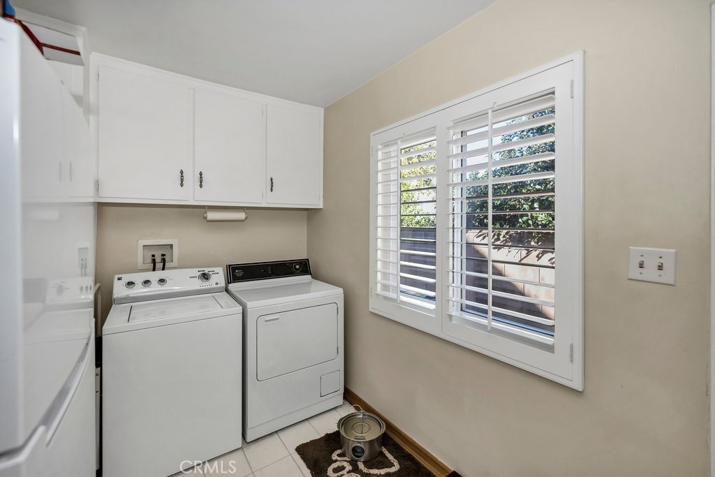 9916 Bothwell Road Northridge, CA 91324 - Photo 16 of 41 a utility room with dryer and washer