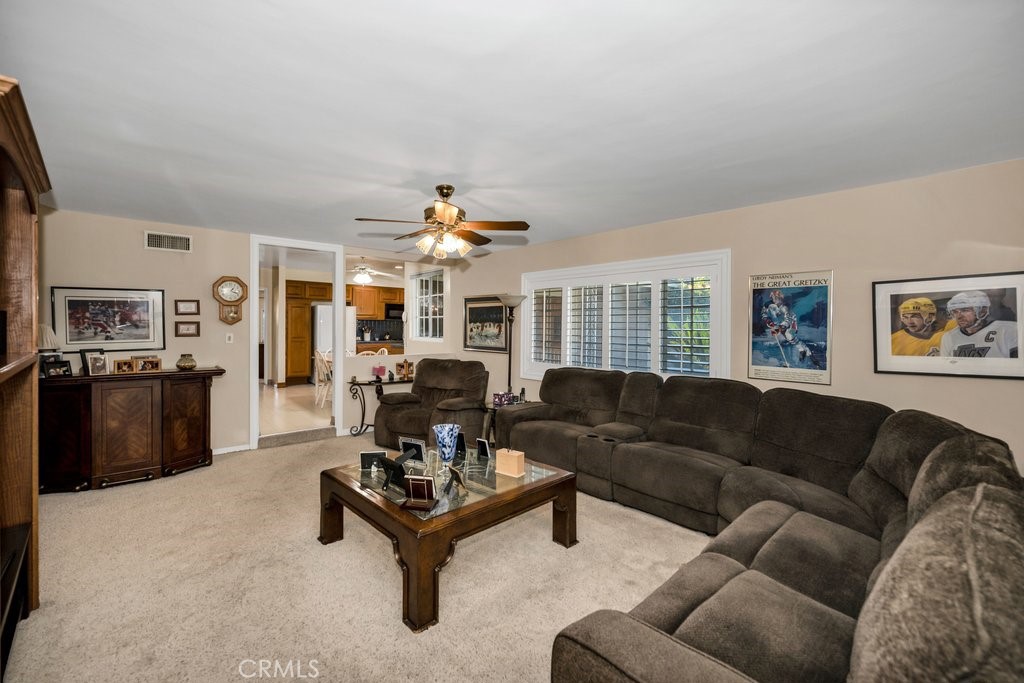 9916 Bothwell Road Northridge, CA 91324 - Photo 18 of 41 a living room with furniture and a table