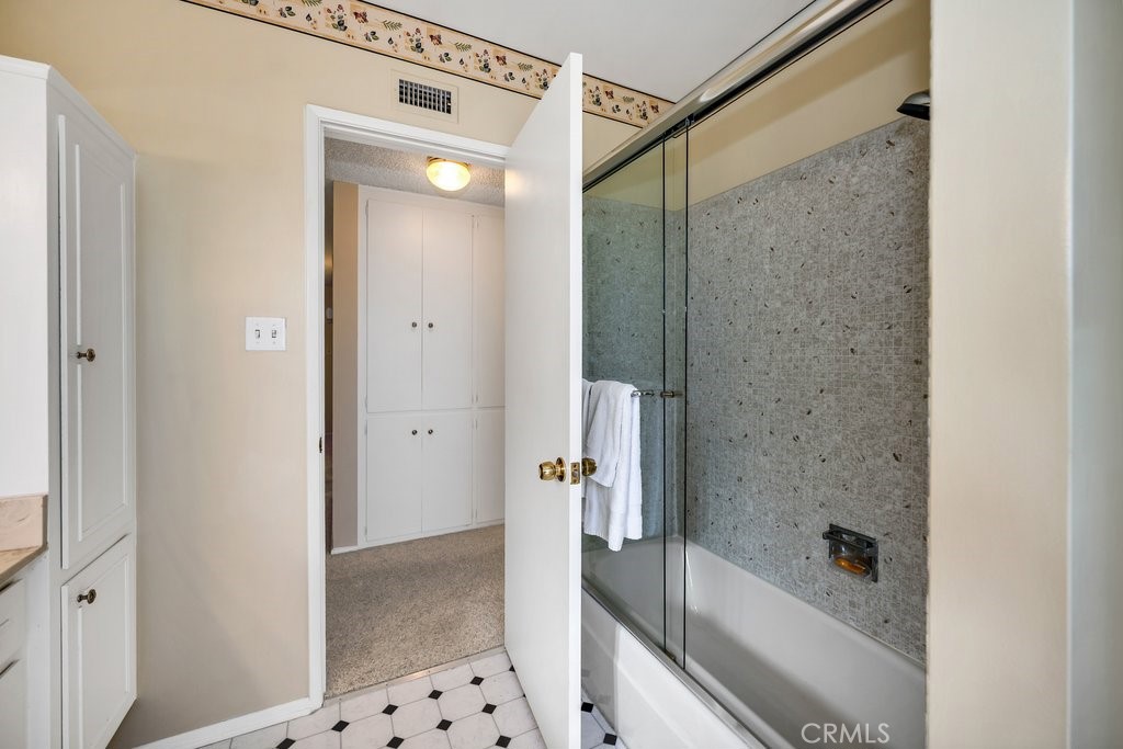 9916 Bothwell Road Northridge, CA 91324 - Photo 25 of 41 a bathroom with a shower and a tub