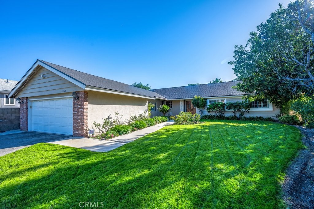 9916 Bothwell Road Northridge, CA 91324 - Photo 5 of 41 a front view of house with yard and green space