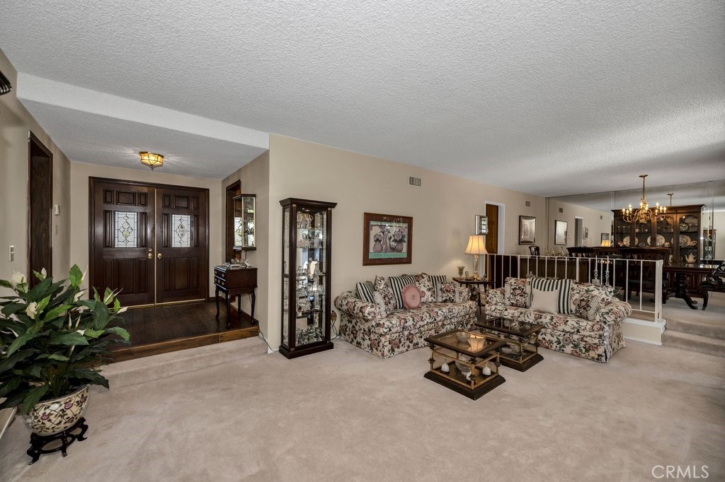 9916 Bothwell Road Northridge, CA 91324 - Photo 7 of 41 a bed room with furniture and a potted plant