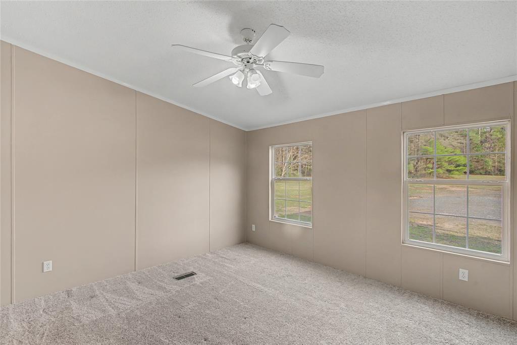 428 Cash Blackmon Road Logansport, LA 71049 - Photo 17 of 40 a view of an empty room with a window