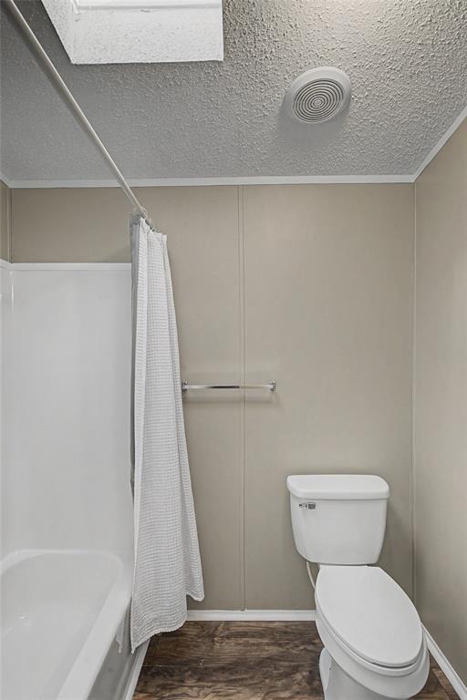 428 Cash Blackmon Road Logansport, LA 71049 - Photo 26 of 40 a bathroom with a toilet and a shower