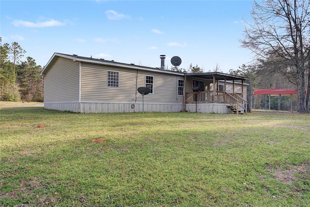 428 Cash Blackmon Road Logansport, LA 71049 - Photo 30 of 40 a house view with a backyard space