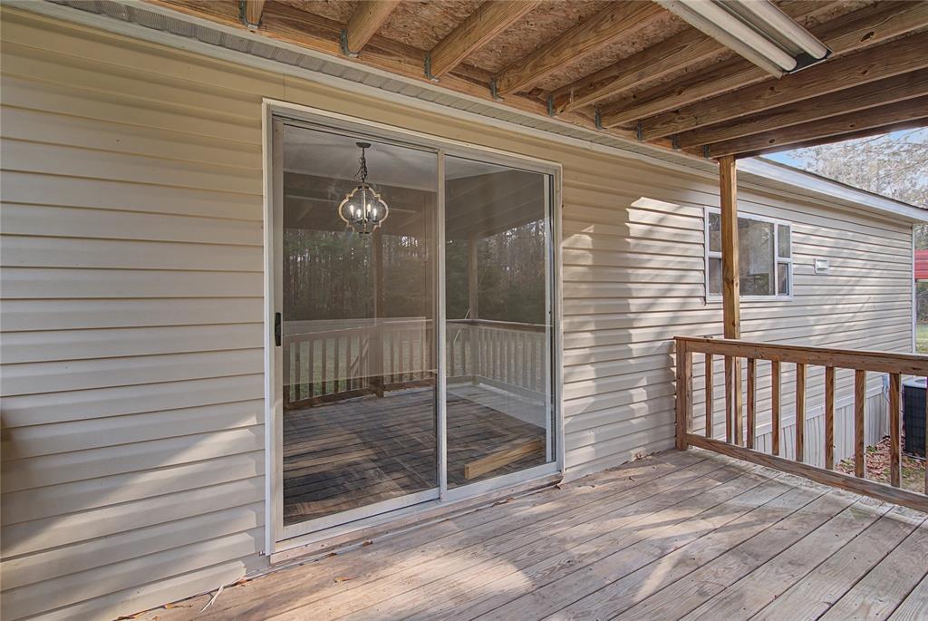 428 Cash Blackmon Road Logansport, LA 71049 - Photo 32 of 40 a view of a door and wooden floor