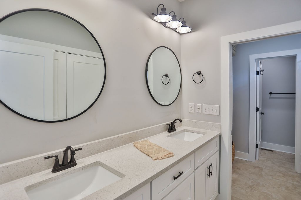 13 Sycamore Ridge West Burns, TN 37029 - Photo 12 of 24 a bathroom with a sink and a mirror