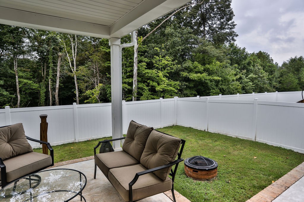 13 Sycamore Ridge West Burns, TN 37029 - Photo 21 of 24 a view of a two chairs in the back yard