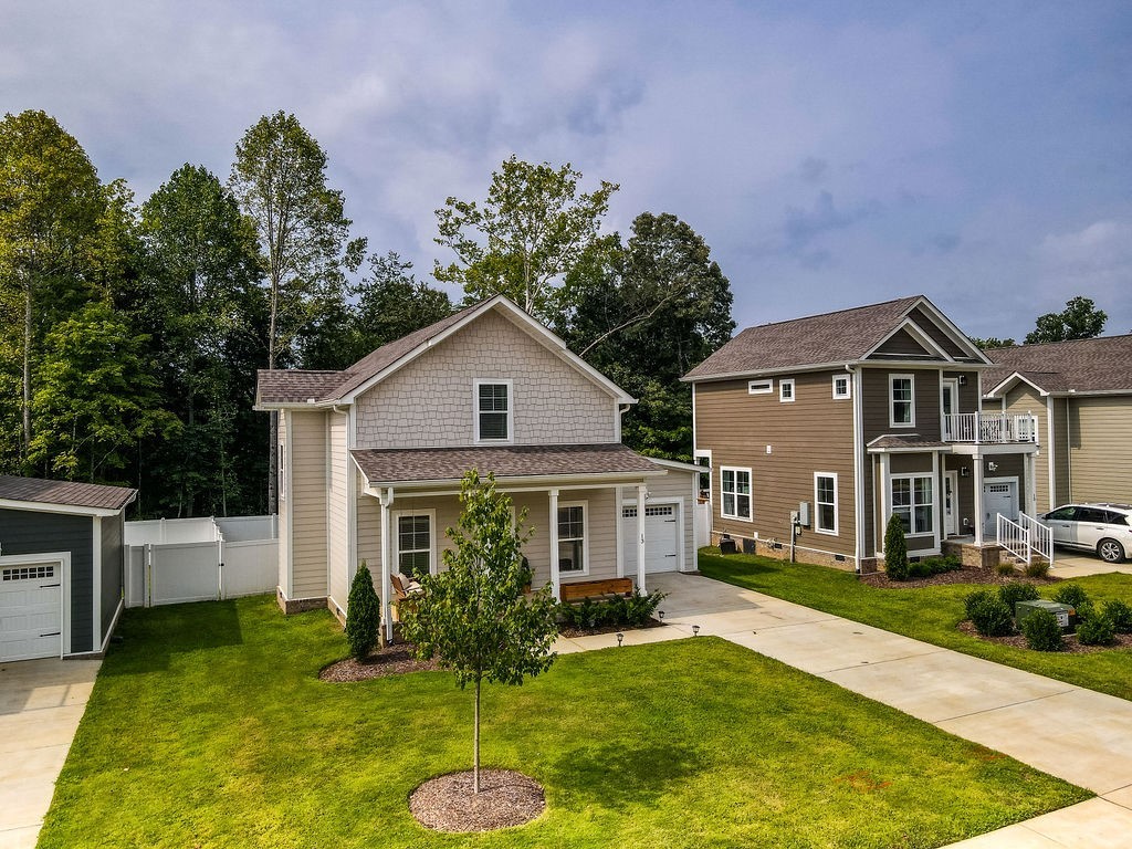 13 Sycamore Ridge West Burns, TN 37029 - Photo 24 of 24 a front view of house with yard and green space