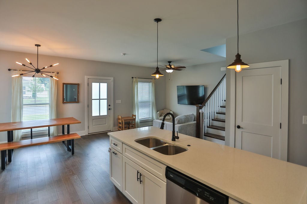 13 Sycamore Ridge West Burns, TN 37029 - Photo 6 of 24 a kitchen with sink cabinets and wooden floor