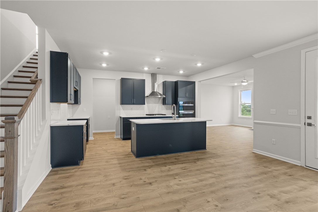 629 Sweetspire Trail, Unit 149 Seneca, SC 29678 - Photo 6 of 30 An open concept design seamlessly connects the kitchen to the living spaces, ideal for modern living.