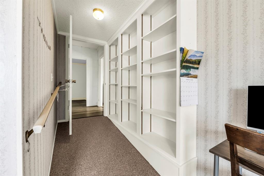 982 North Houston Street Lorena, TX 76655 - Photo 13 of 35 a view of entryway with stairs and wooden floor