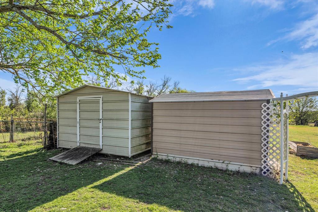 982 North Houston Street Lorena, TX 76655 - Photo 24 of 35 a view of a back yard of the house