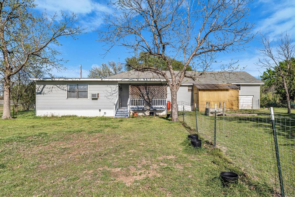 982 North Houston Street Lorena, TX 76655 - Photo 27 of 35 a view of a house with a yard