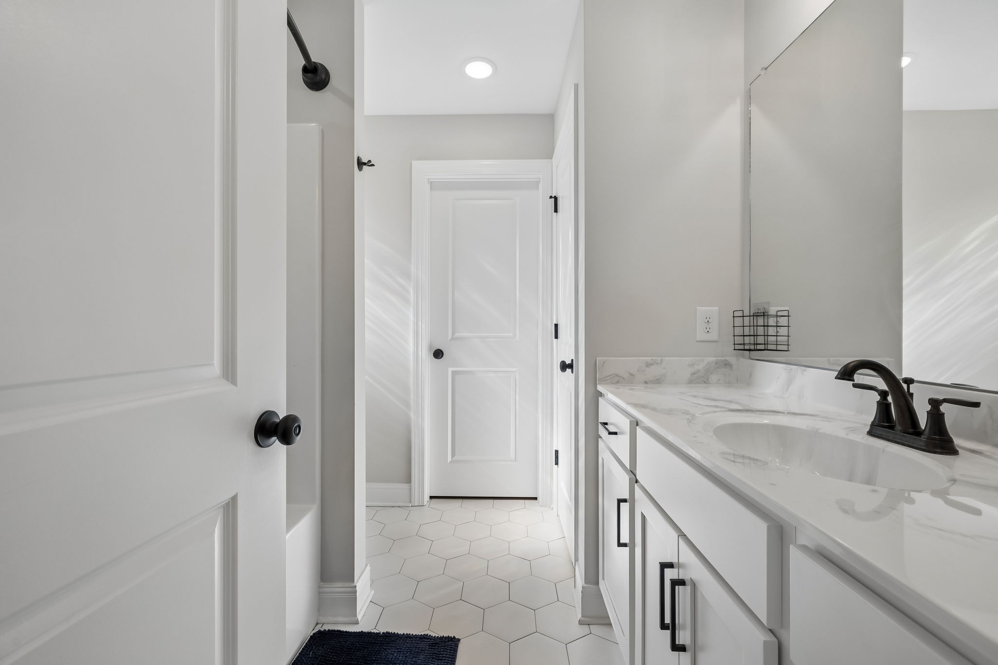 3165 Lights Chapel Road Greenbrier, TN 37073 - Photo 11 of 17 a bathroom with a granite countertop sink a mirror and shower
