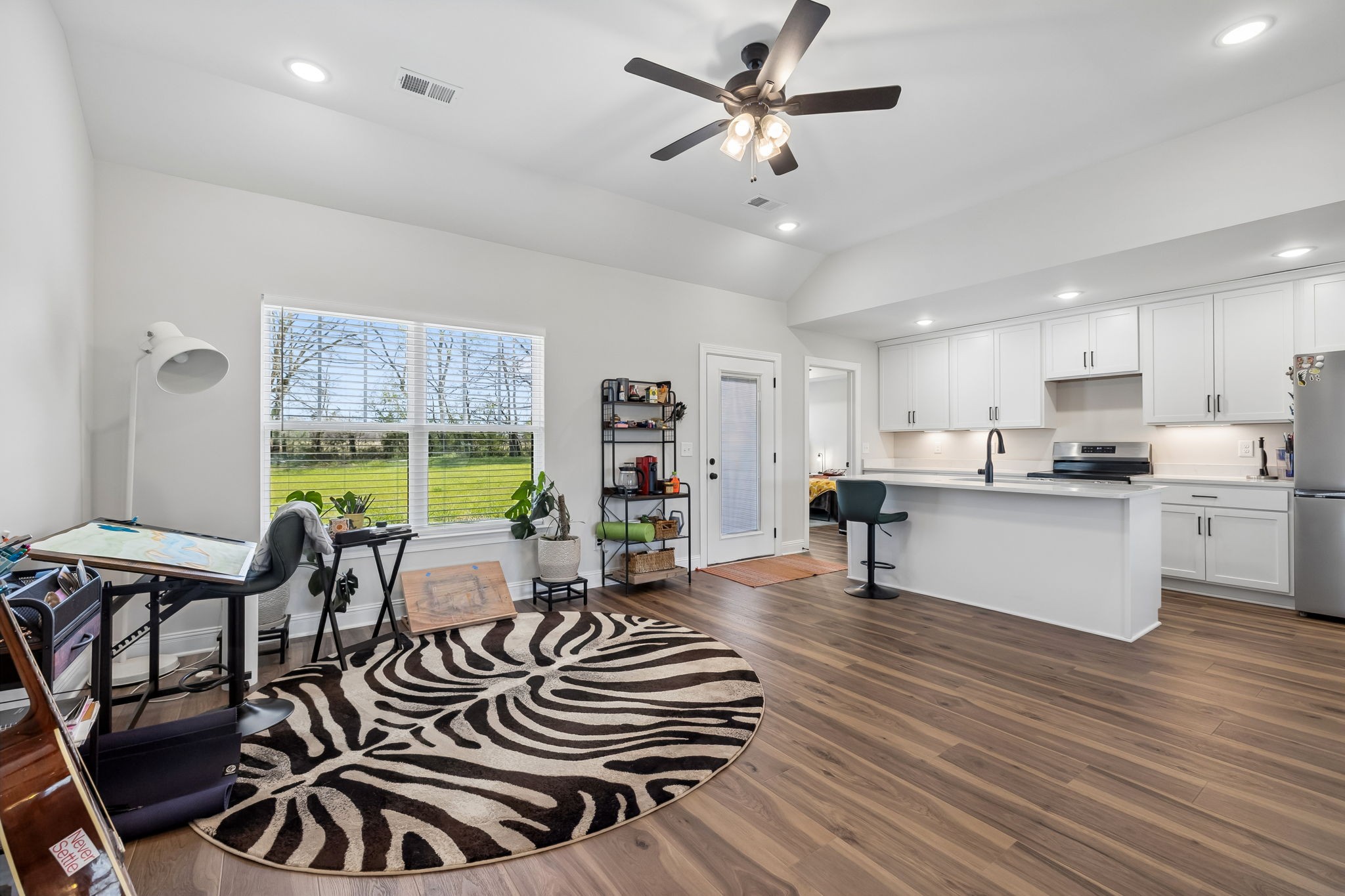3165 Lights Chapel Road Greenbrier, TN 37073 - Photo 2 of 17 a view of a kitchen and dining room