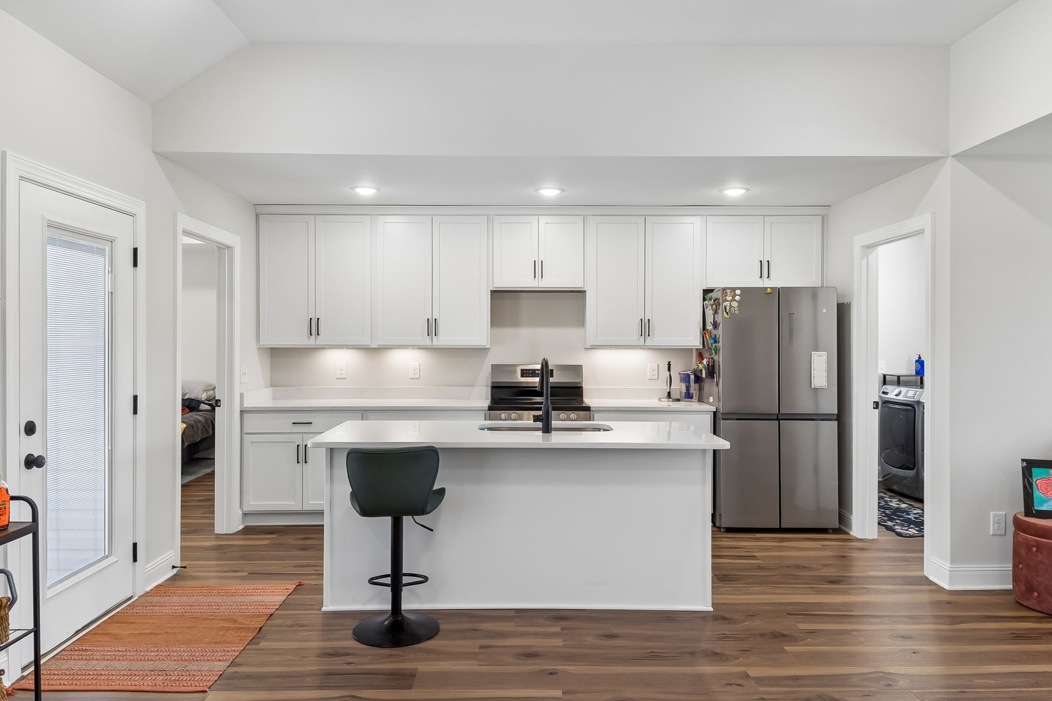 3165 Lights Chapel Road Greenbrier, TN 37073 - Photo 5 of 17 a kitchen with stainless steel appliances granite countertop a refrigerator a stove a sink and a microwave