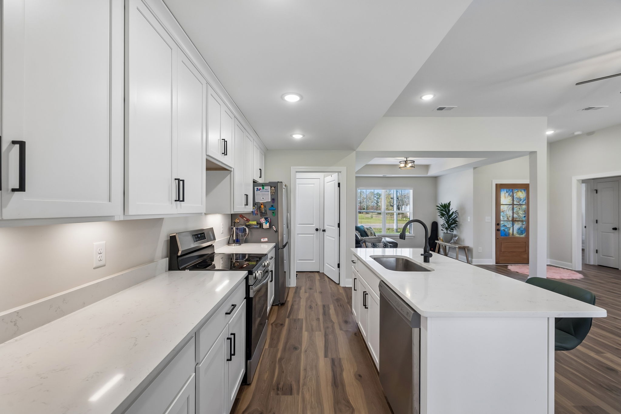 3165 Lights Chapel Road Greenbrier, TN 37073 - Photo 6 of 17 a kitchen with stainless steel appliances a sink stove and refrigerator