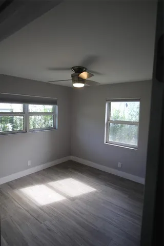 an empty room that has a window