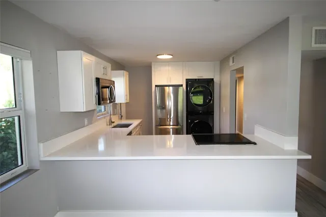 a bathroom with a bathtub and a sink