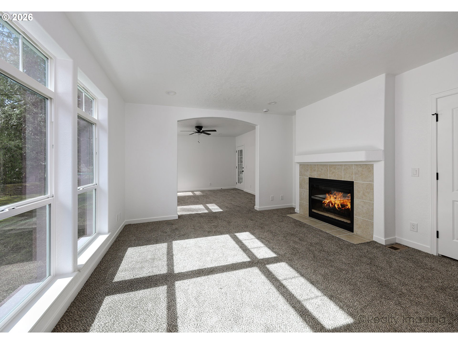 68908 East Cedar Hill Loop Welches, OR 97067 - Photo 11 of 21 a view of an empty room and fire place
