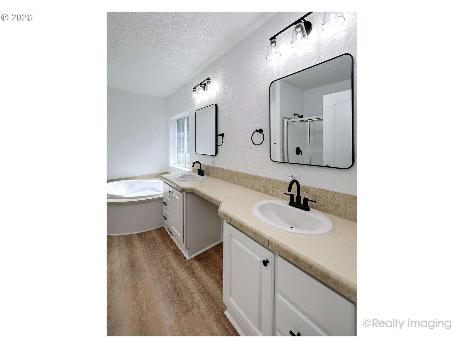 68908 East Cedar Hill Loop Welches, OR 97067 - Photo 13 of 21 a bathroom with a double vanity sink mirror and toilet