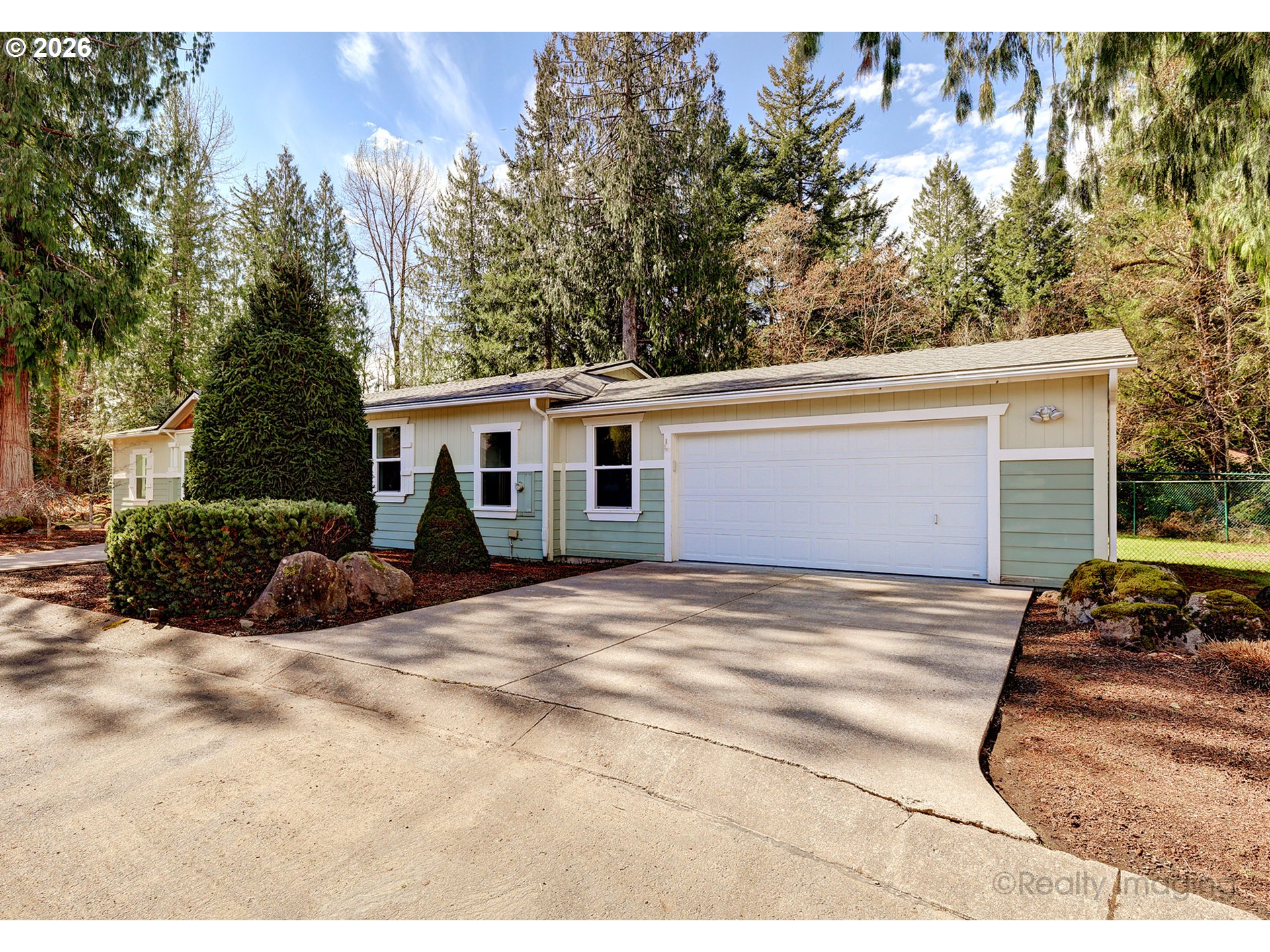 68908 East Cedar Hill Loop Welches, OR 97067 - Photo 2 of 21 a view of a house with a patio
