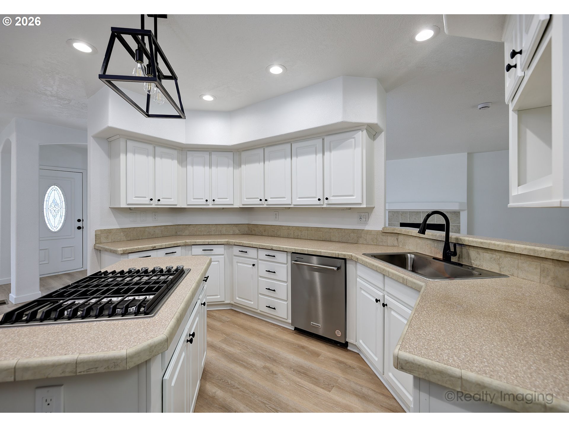 68908 East Cedar Hill Loop Welches, OR 97067 - Photo 8 of 21 a kitchen with sink a cabinetry and appliances