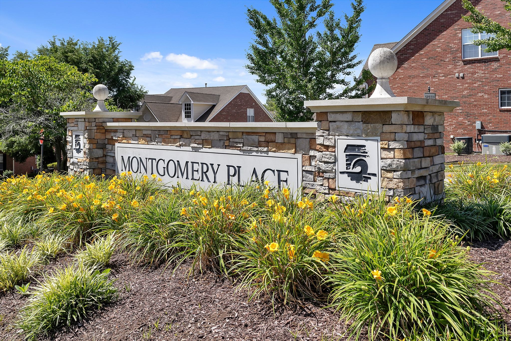 1311 Decatur Circle Franklin, TN 37067 - Photo 2 of 38 a front view of a building with garden