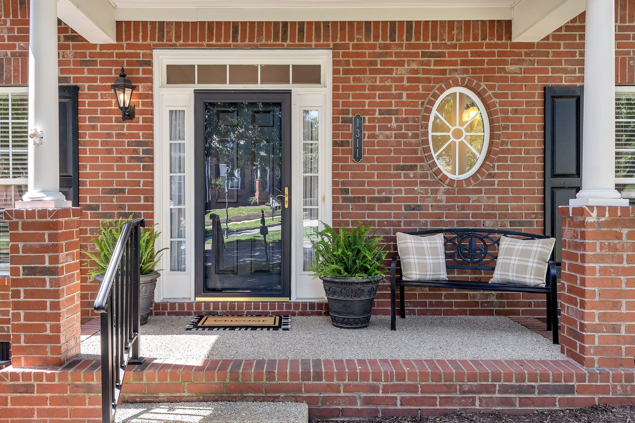 1311 Decatur Circle Franklin, TN 37067 - Photo 5 of 38 a couple of potted plants in front of door